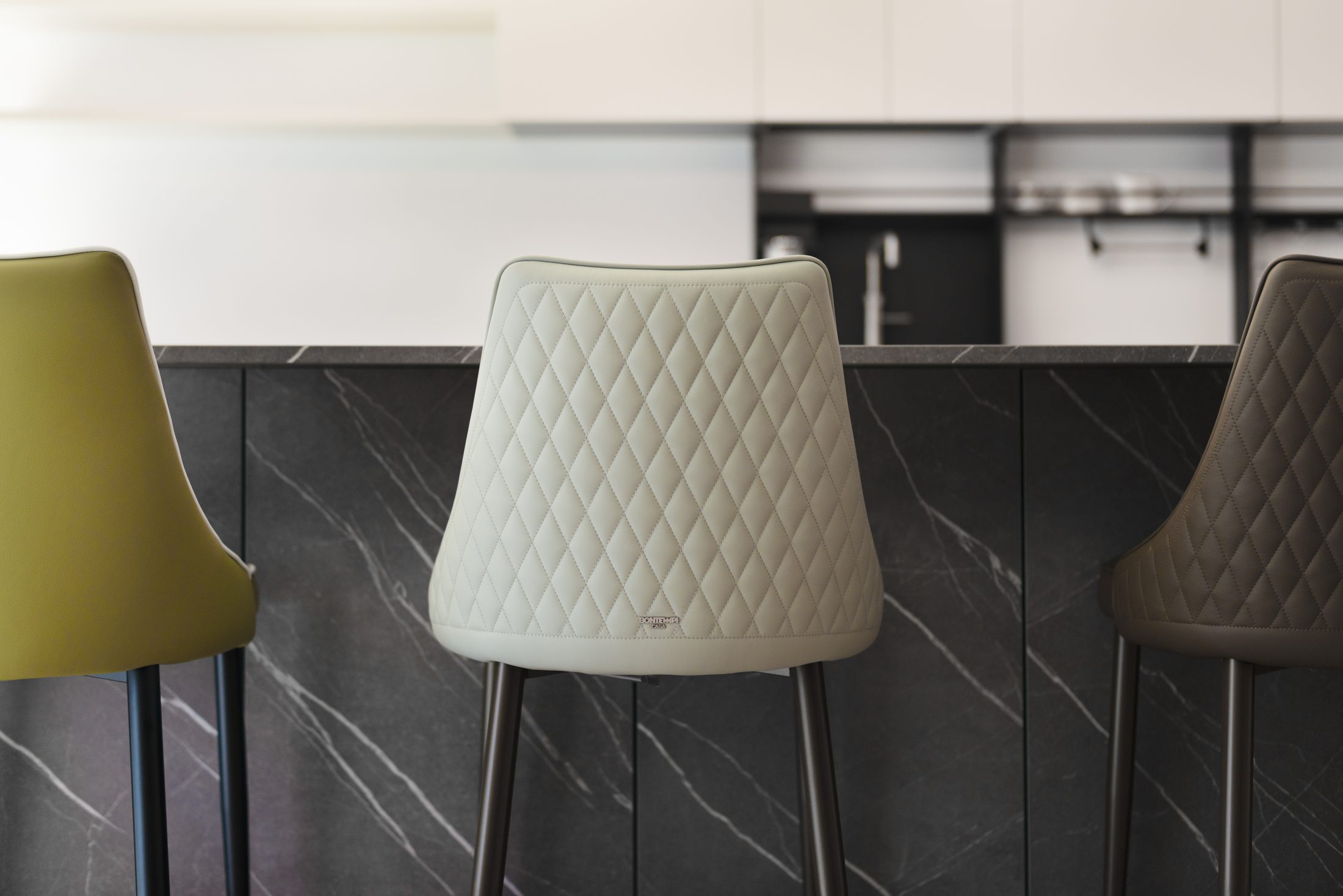 Italian bar stools on display at the Studio & Build showroom in Sutton